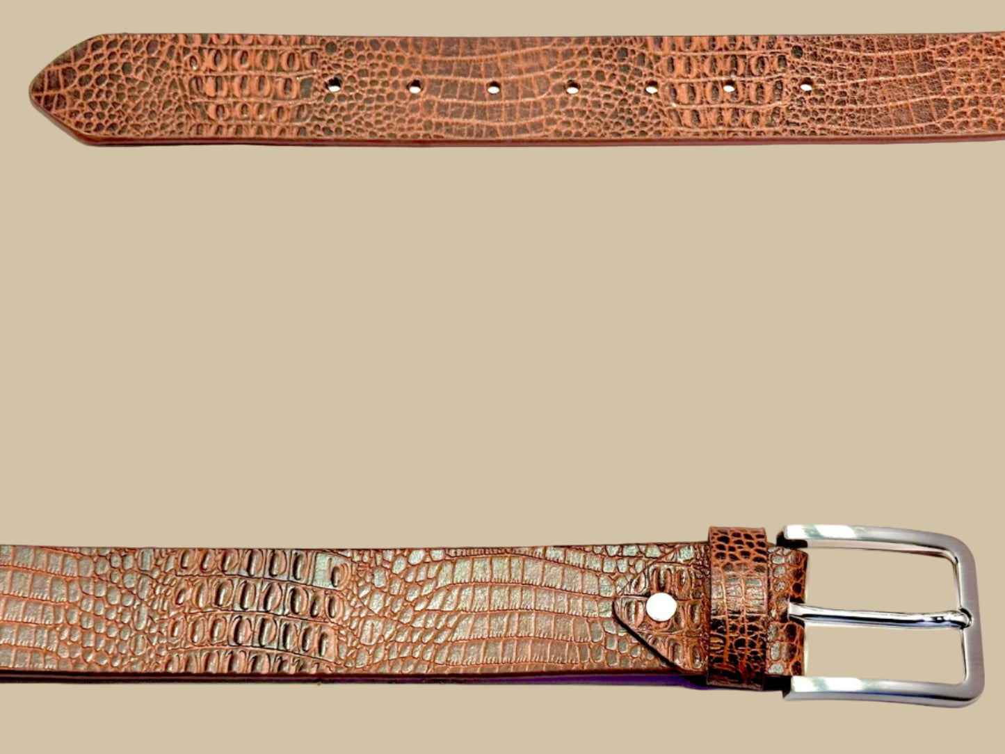 Brown crocodile-patterned belt with a silver buckle on a white background