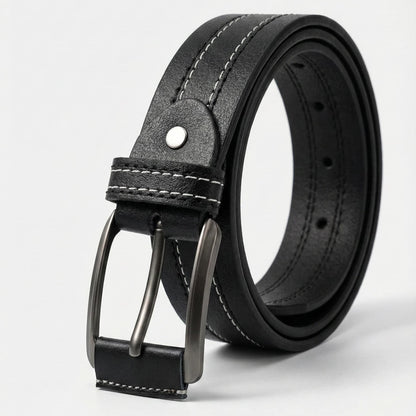 Black leather belt with a silver buckle on a light gray background