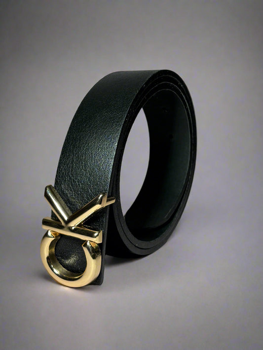 Black leather belt with a gold buckle on a gray background