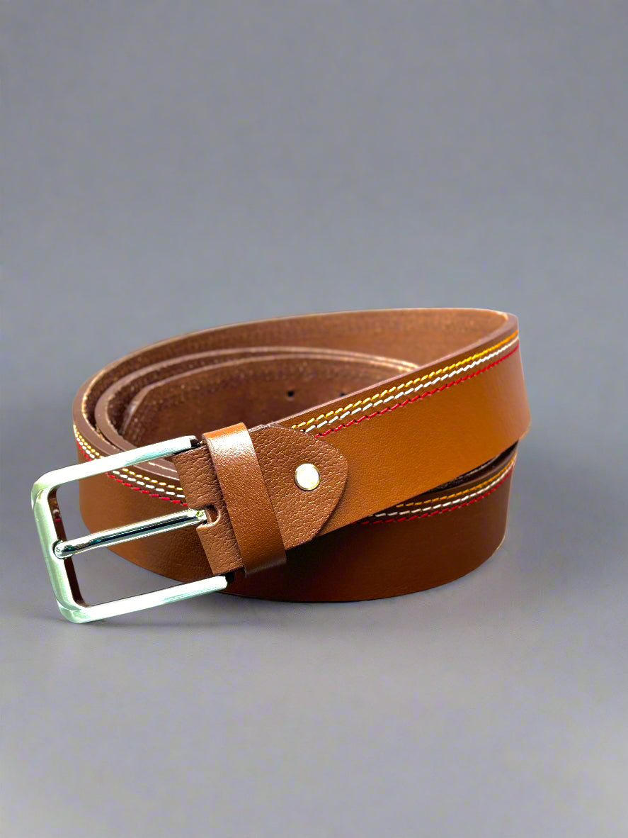 Brown leather belt with silver buckle on a reflective surface